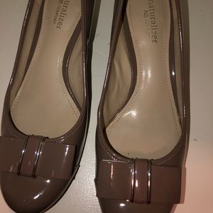 Naturalized taupe bow pumps